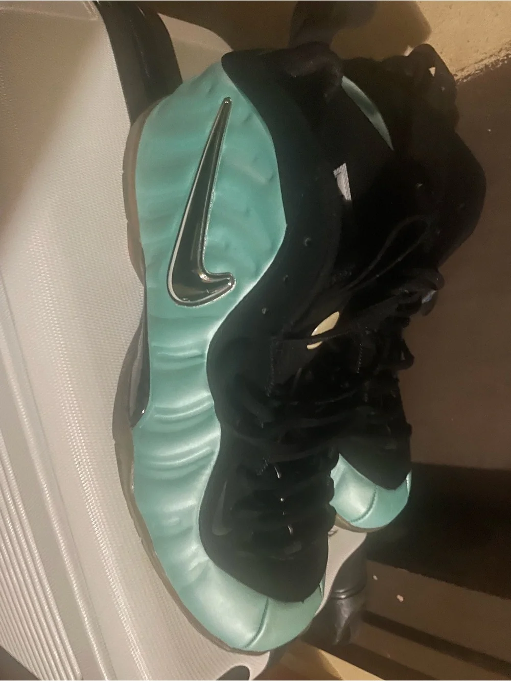 Nike men’s Foamposite Sneakers in Teal and Black